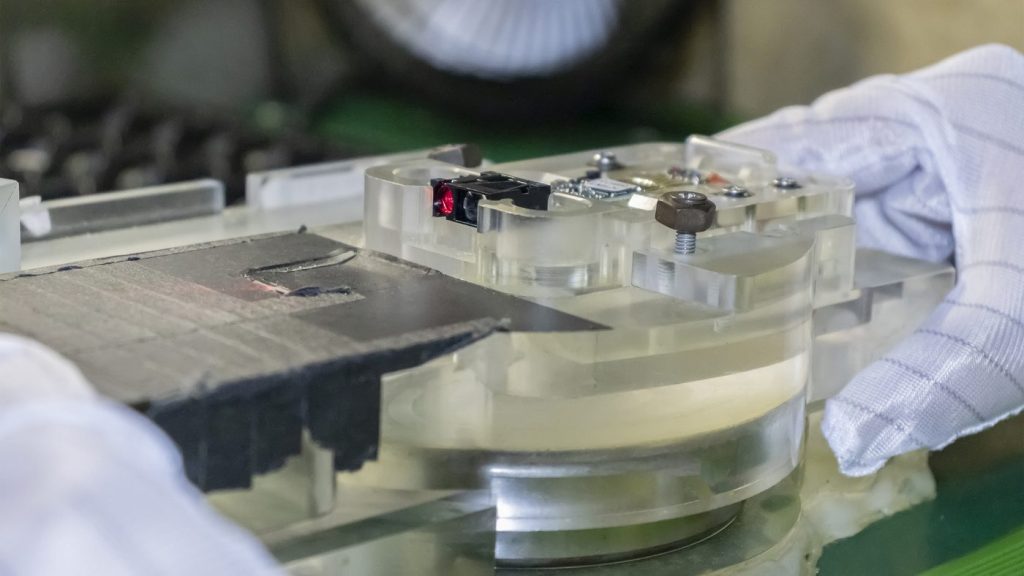 Precision assembly fixture for optical alignment of a laser ranging sensor module